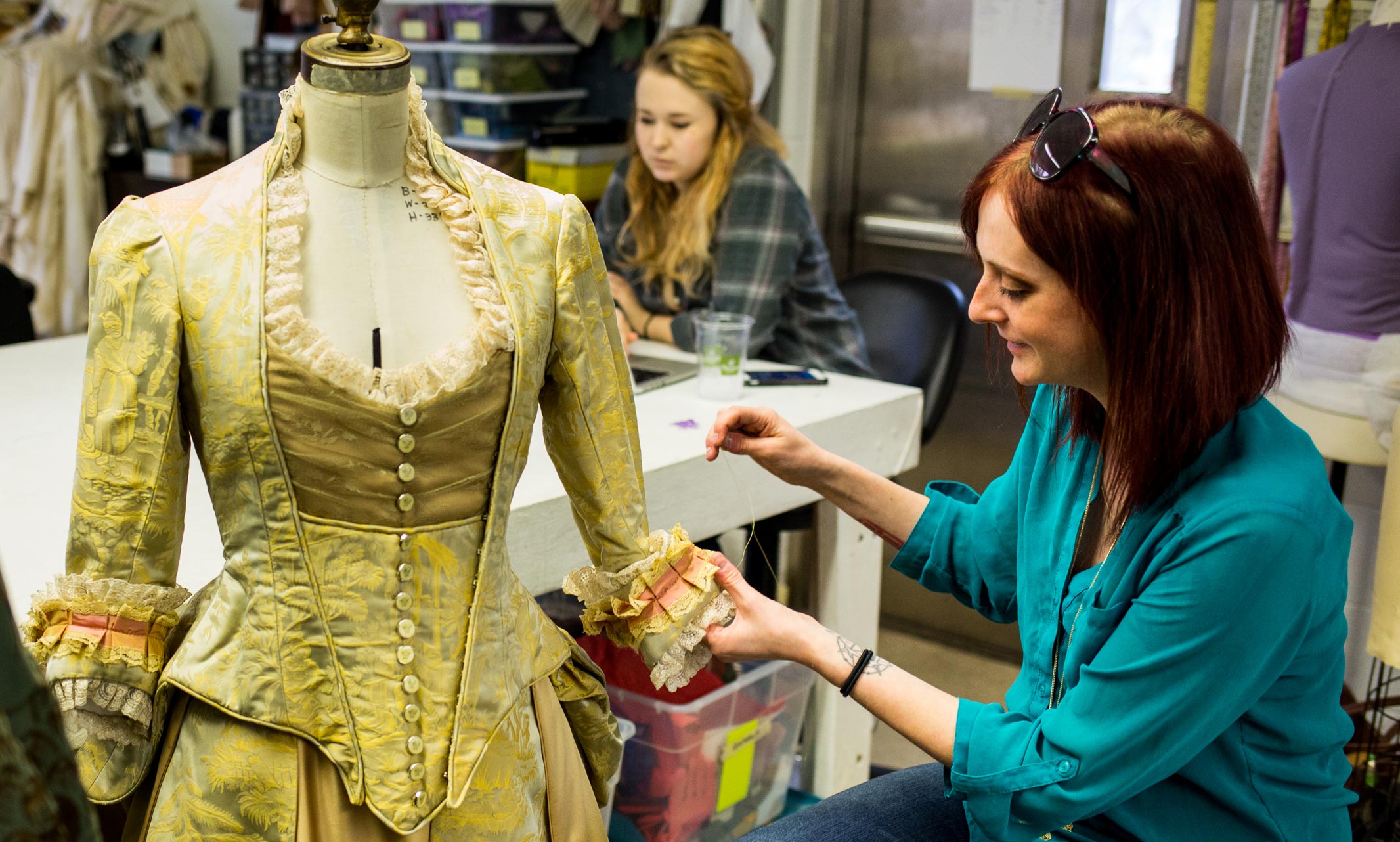 Graduate student works on historical costume dress