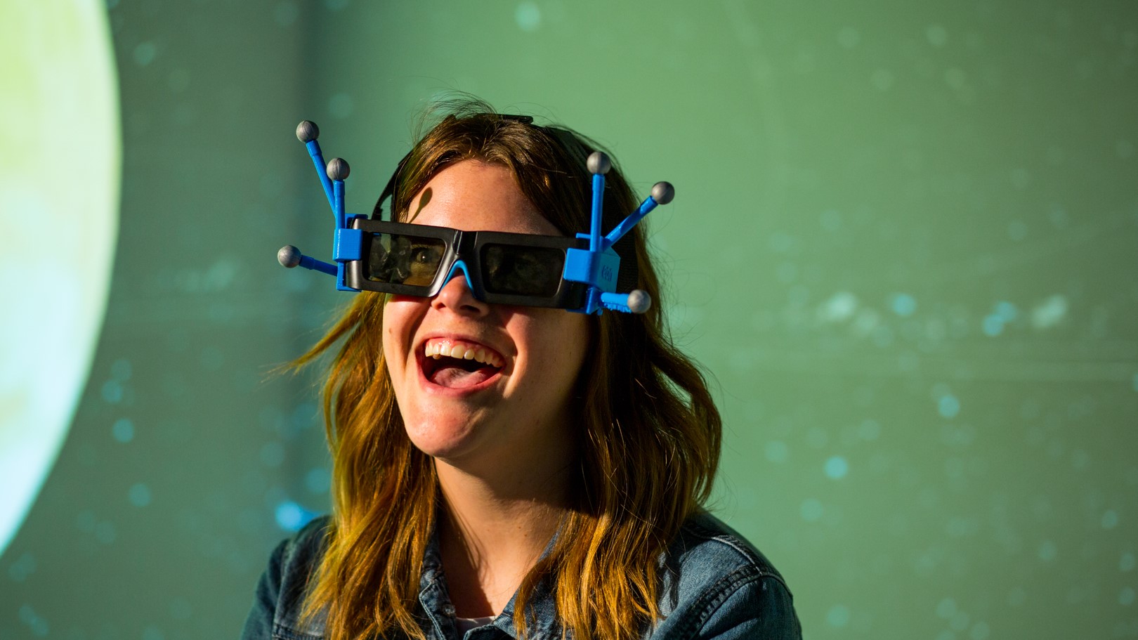 student wears glasses with antennae located around them