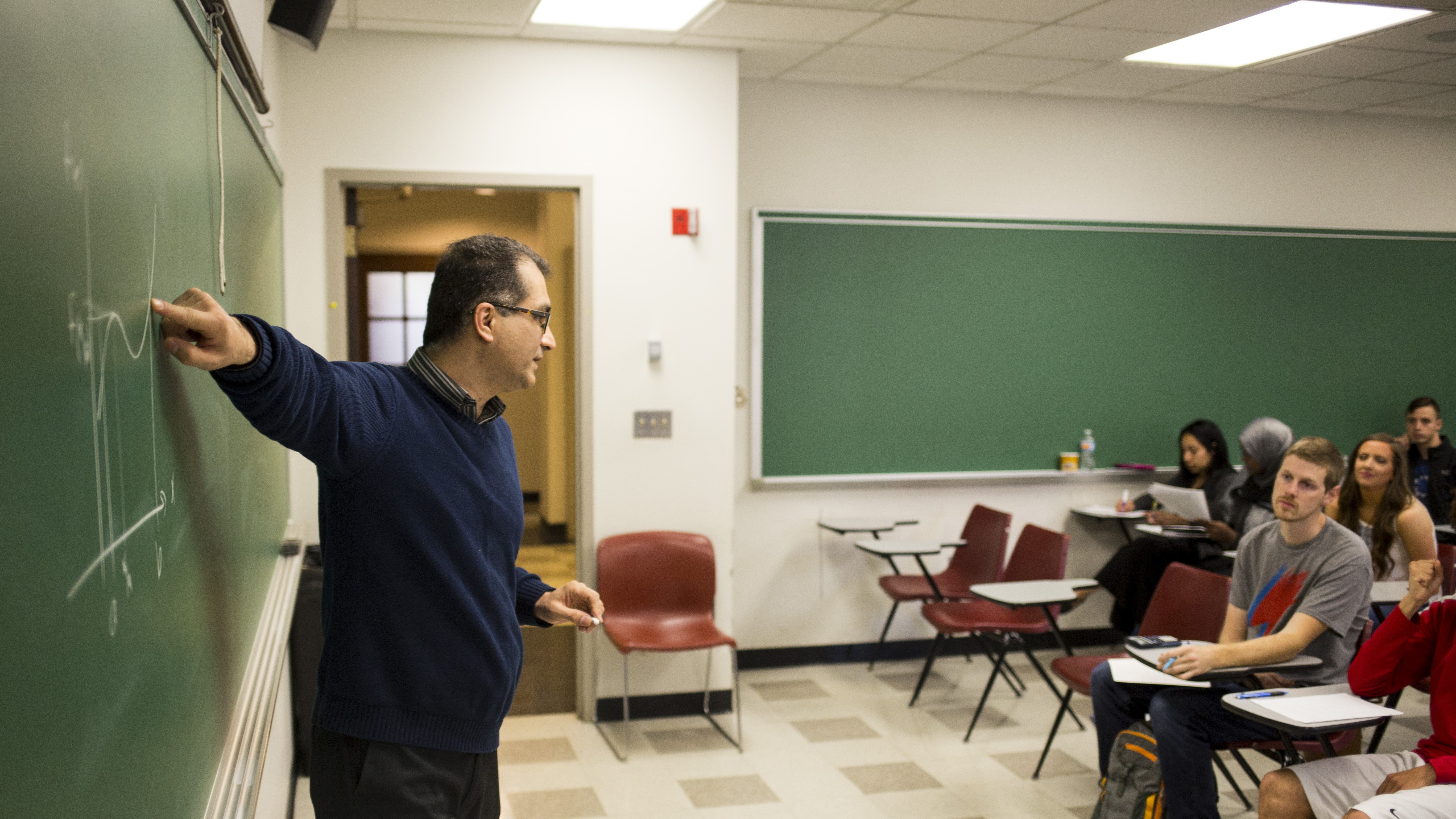 a photo of faculty talking