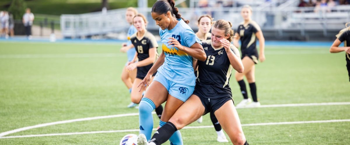 KC Roos women's soccer team out on field 