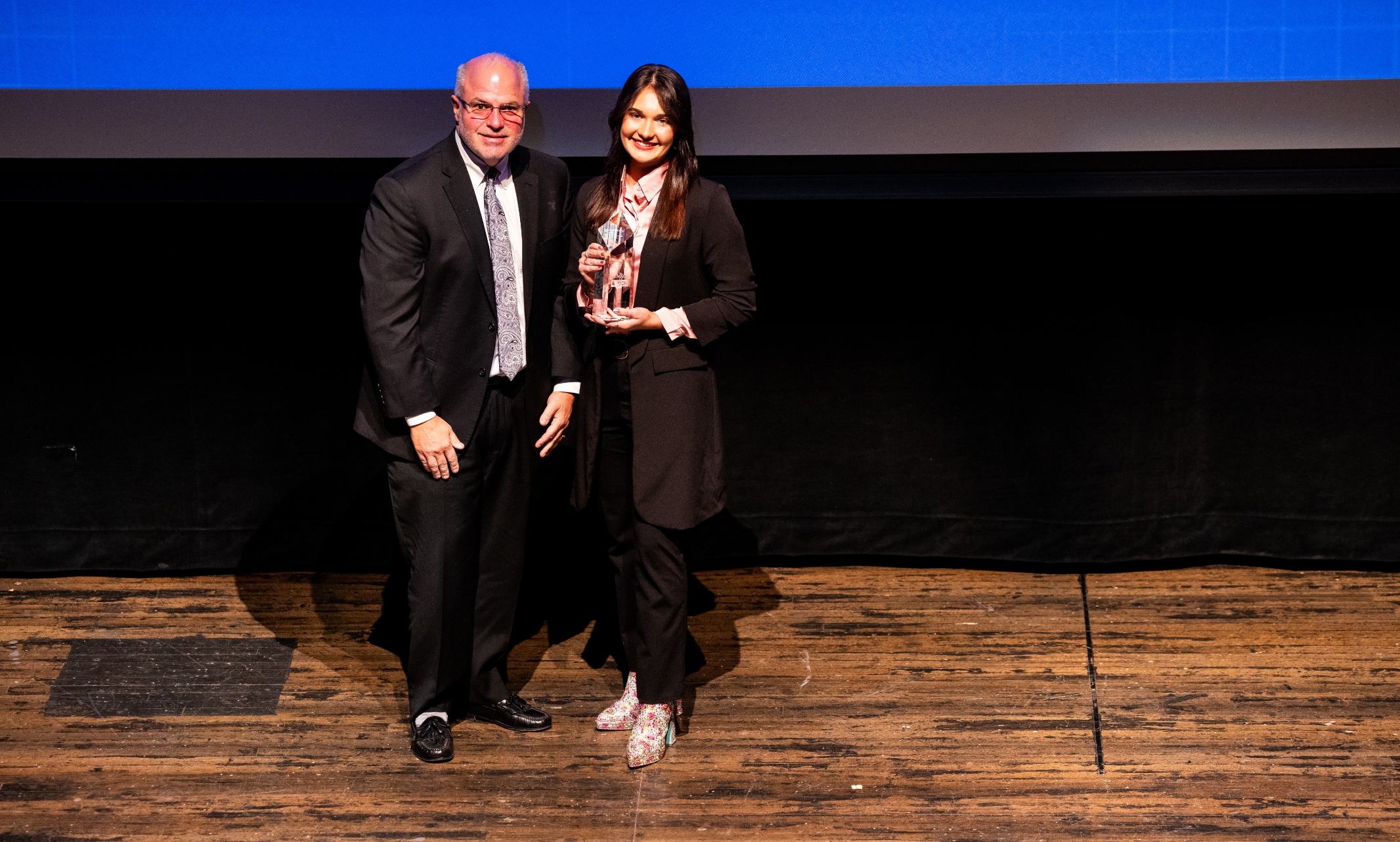 Grace Kertz accepts her Student Entrepreneur of the Year award