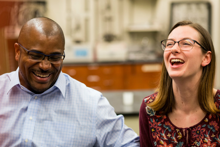 George White Jr. and Jewel Janke laughing together in engineering lab