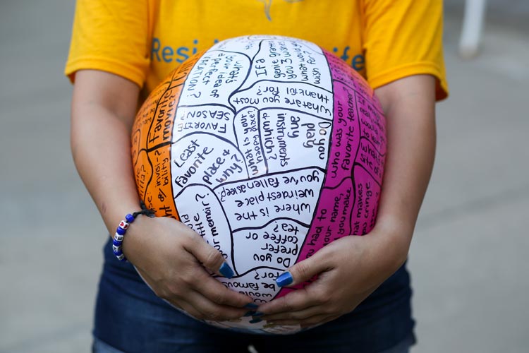 close-up of a beach ball with icebreaker questions for Residence Hall Wing Meeting icebreakers