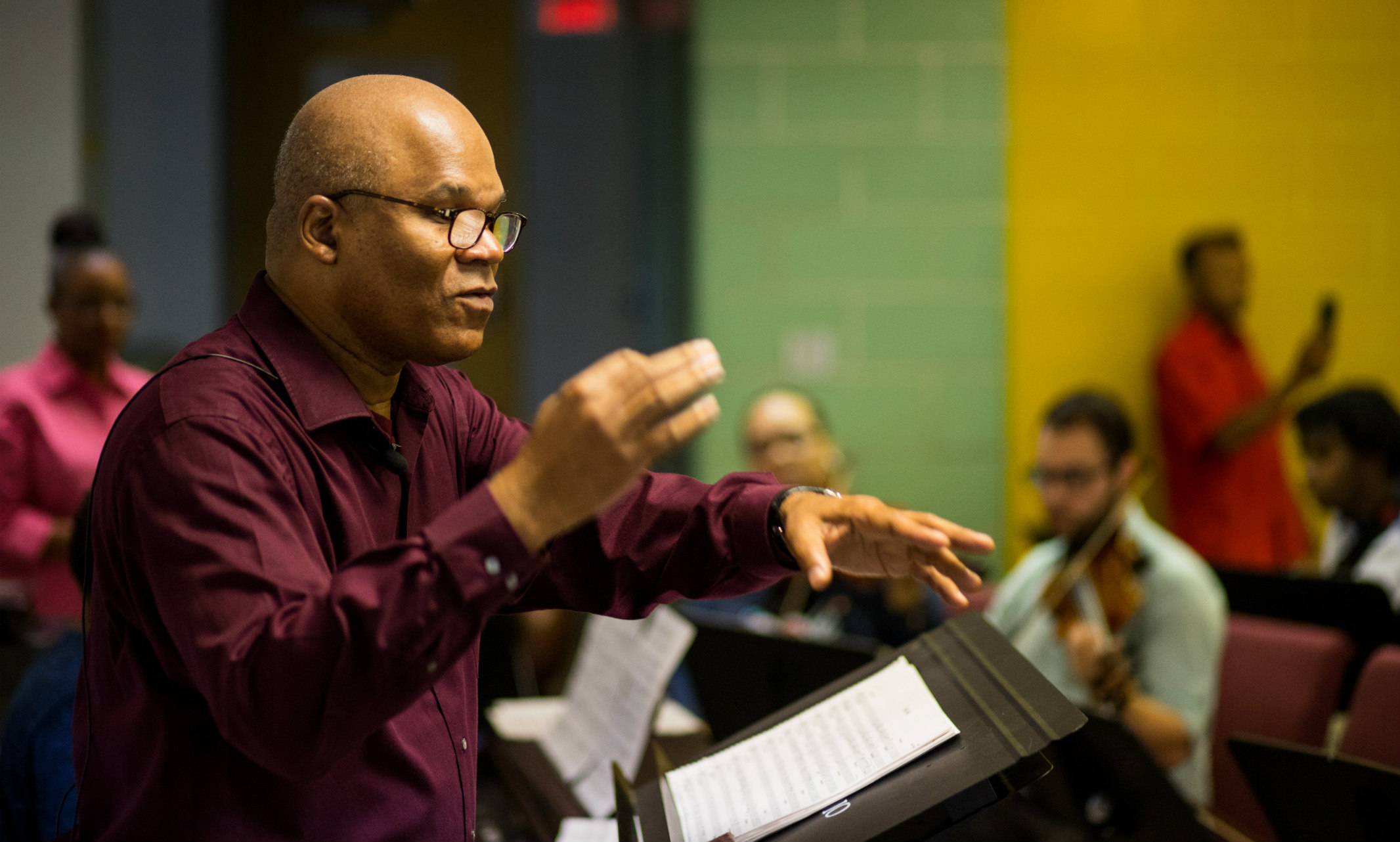 Darryl Chamberlain conducting a group of student musicians