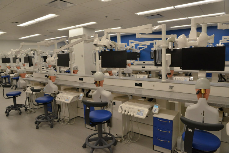 The UMKC School of Dentistry simulation lab that shows the expanse of state-of-the-art equipment and space. No people in this photograph.