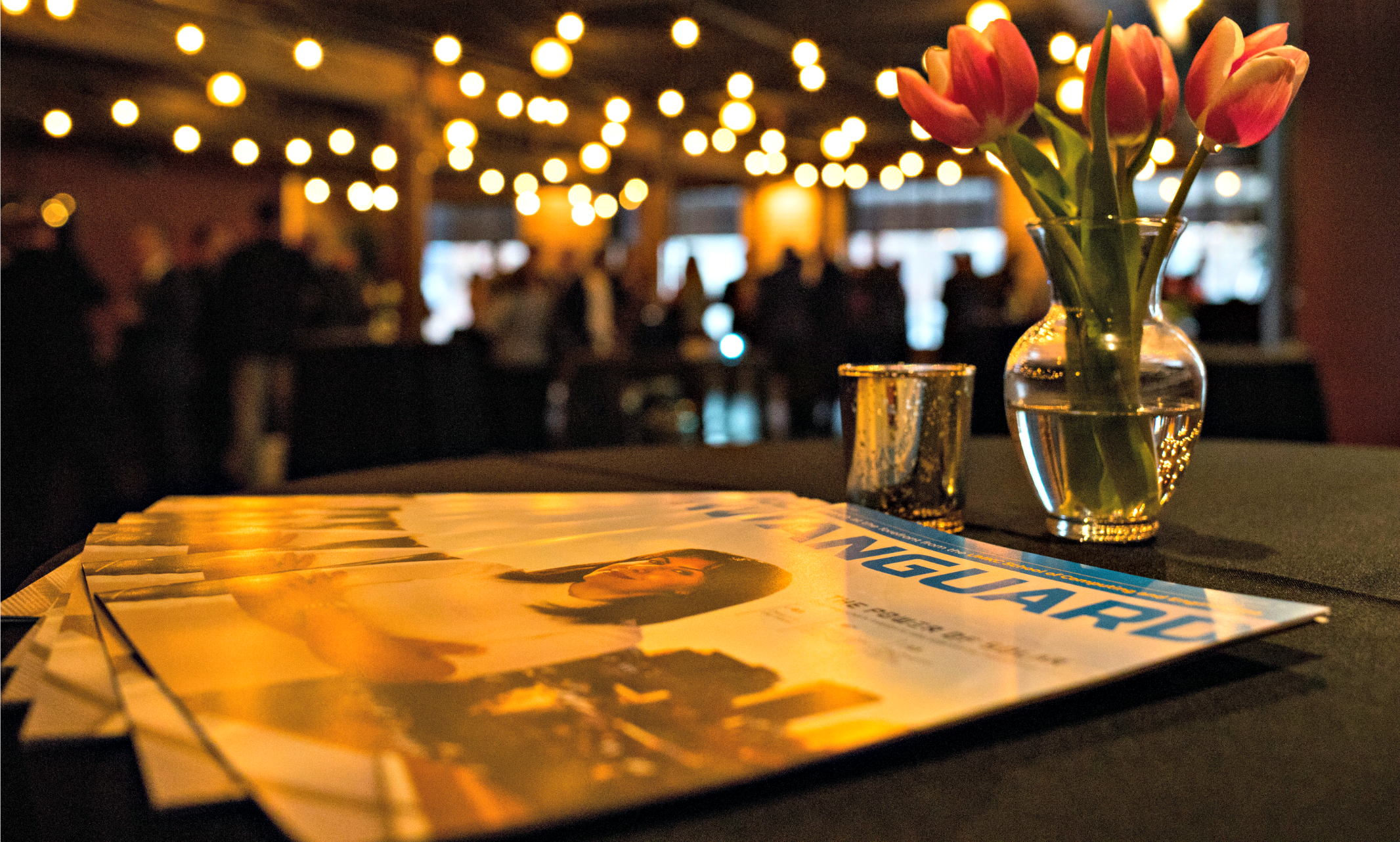 photo of Vanguard magazine on table with flowers