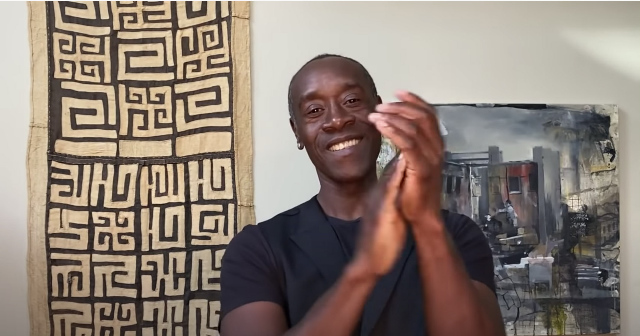 photo of Don Cheadle at home clapping in congratulations for the Roos