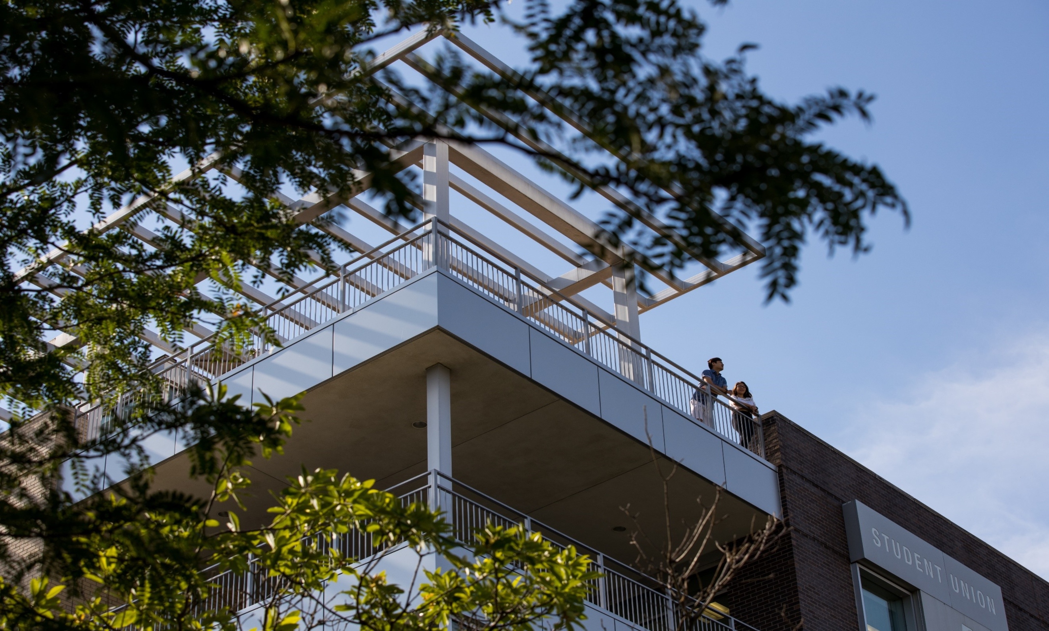 A view looking up at the Student Union rooftop