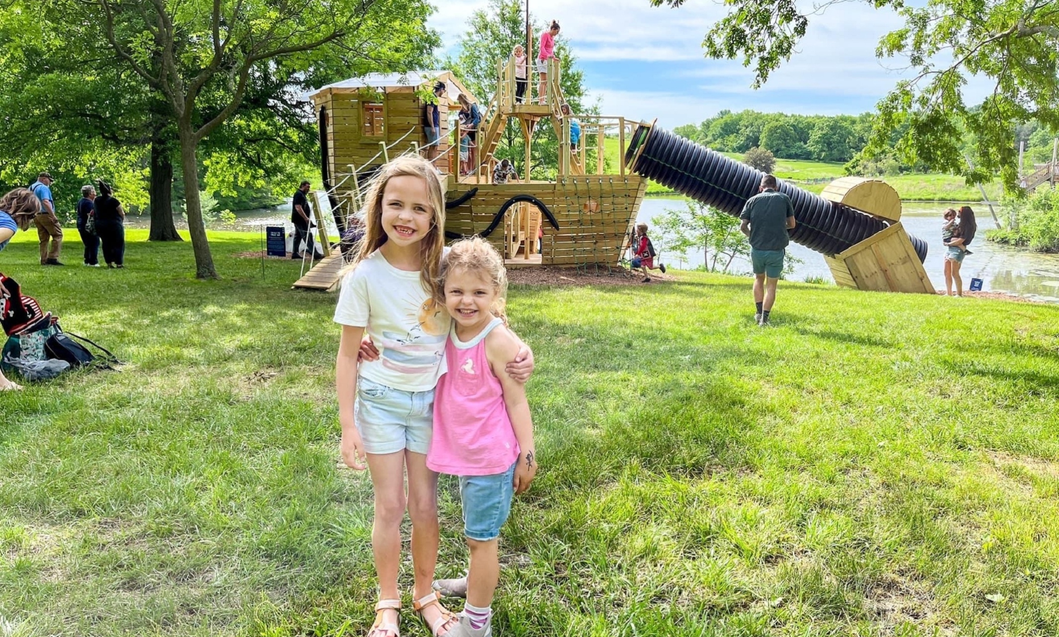 two children stand in front of a fort at Powell Gardens