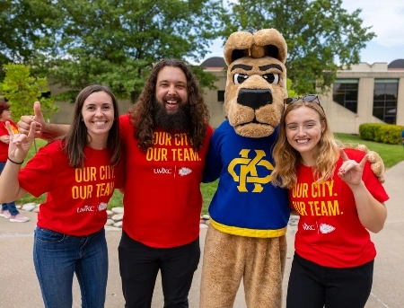 A few Red Friday Roos Tailgate attendees pose with KC Roos.