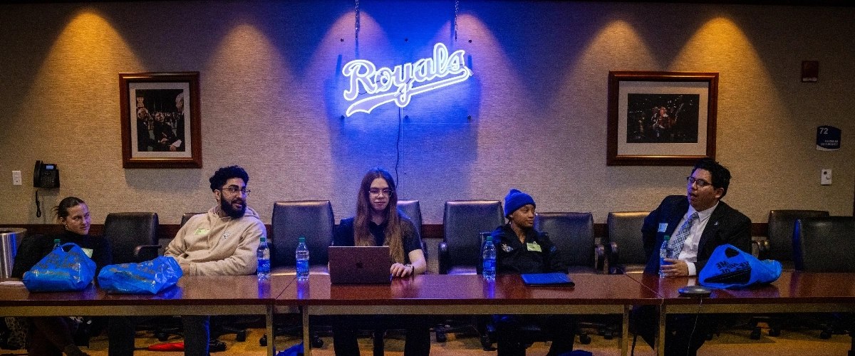 Students sitting at table visiting Pine Tar Collective